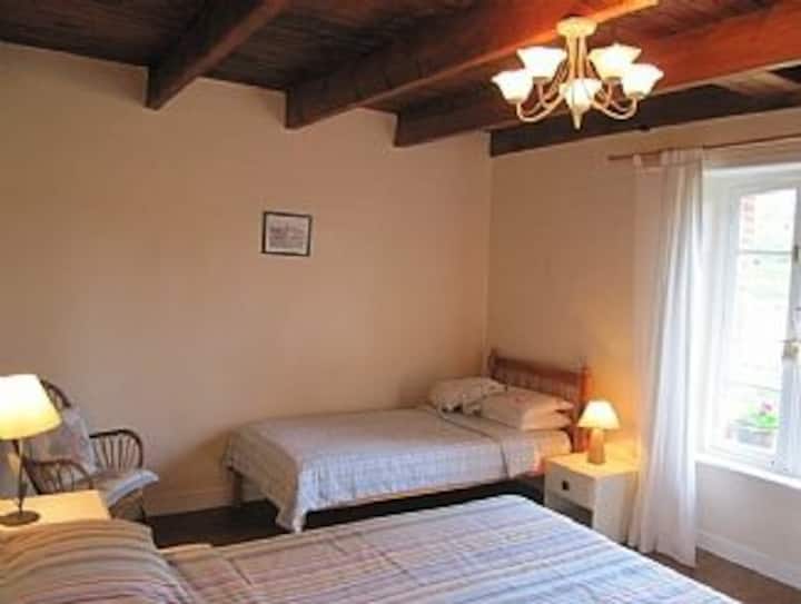 One of the many bedrooms within the gite