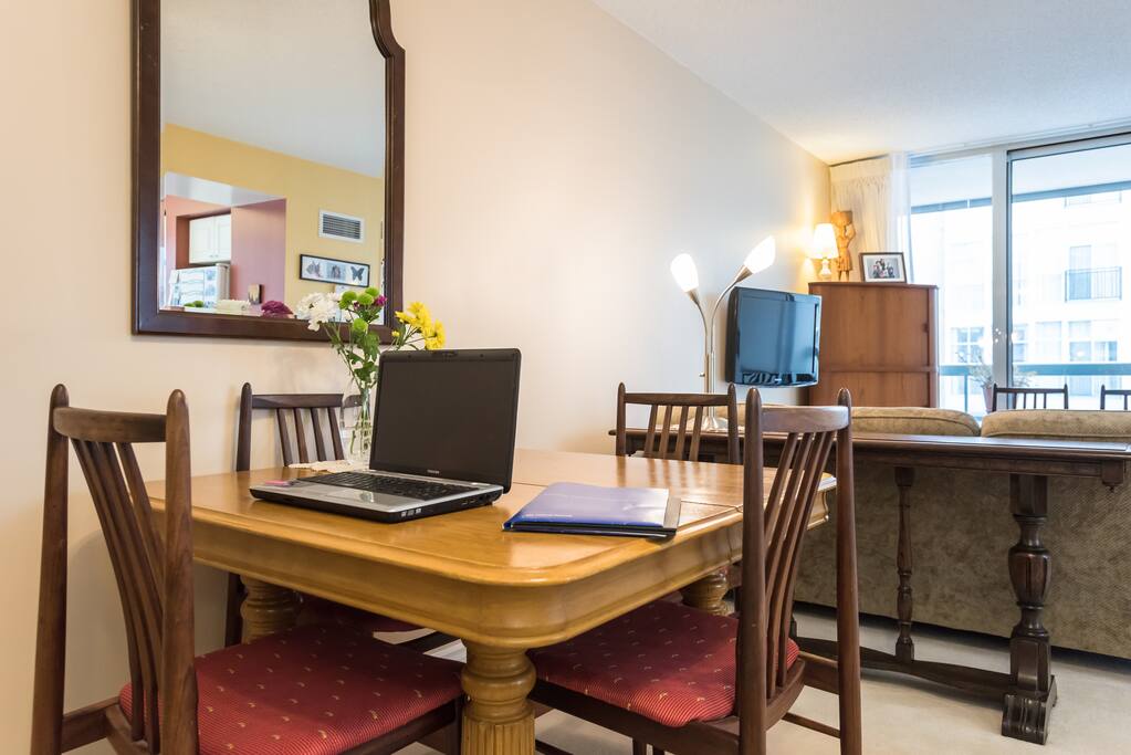 Dining table also doubles as a desk/workspace