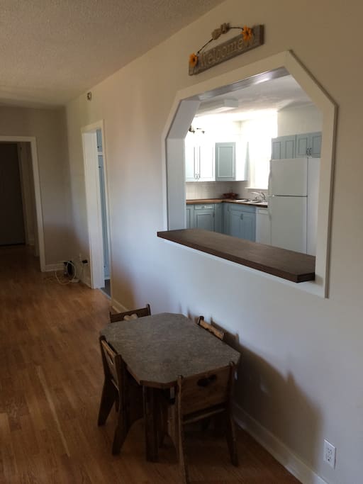 Kids table with peek into the kitchen from living room