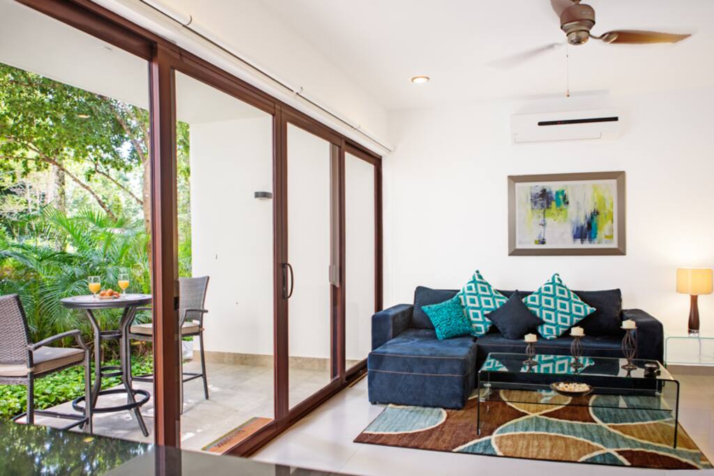 Living room with large windows to the patio