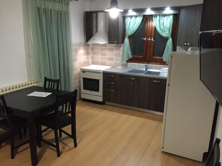 Kitchen with a sofa