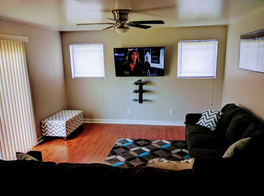 Big TV with plenty of seating for movie night