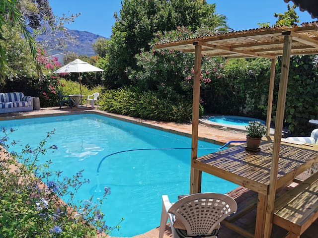Poolside Garden Cottage with adjacent bachelor apt