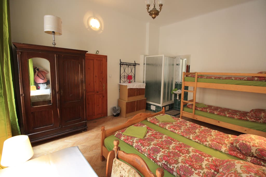 bedroom D8 , 4 beds ,writing desk, wardrobe, shower unit , ideal for couples