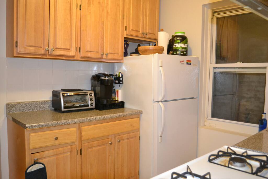 Refrigerator in kitchen.