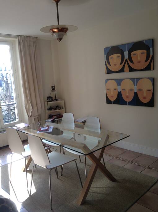 Sunny dining room with piano