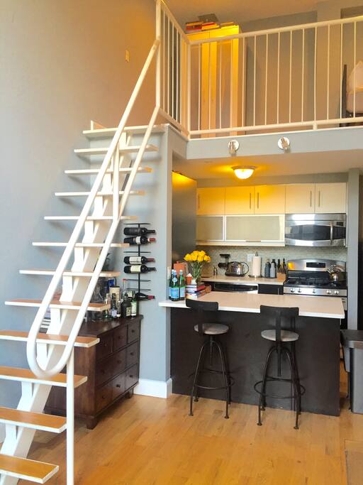 Breakfast bar and kitchen under the loft.