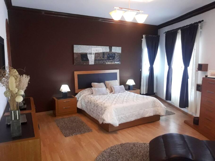 Suite Bedroom with double bed, seating area, TV, walking closet, private bathroom, views, relaxing chair ★ Dormitorio con baño privado, vestidor, cama doble, vistas, TV, sillón