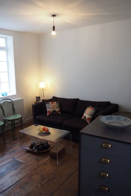 View of open plan living room from the kitchen area