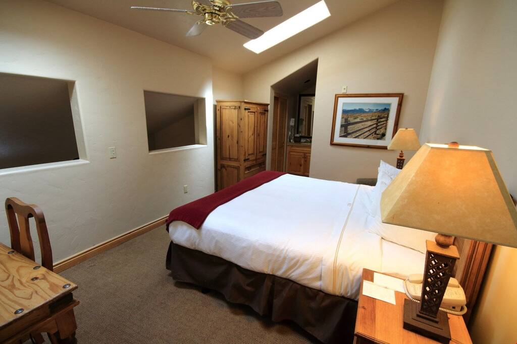 Slide into this cozy bed at the end of the day. Bedding configurations may vary.