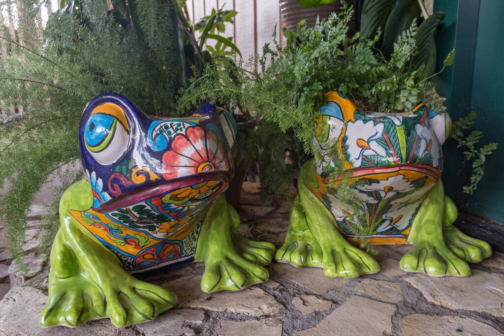 "Urp and Burp" our ceramic frogs greet you at the front door.
