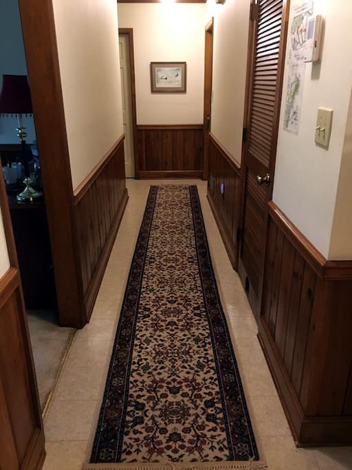 A short walk down the central hall and you'll find your room to the left with your name and picture on the door.