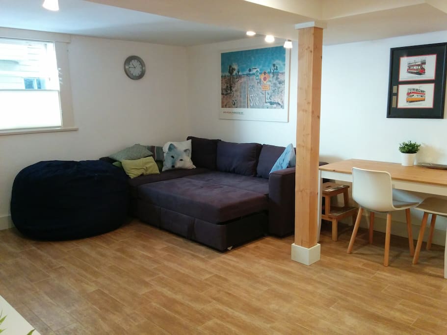 Spacious, light-filled living room. Sofa coverts to a sofa-bed, plus giant bean bag..