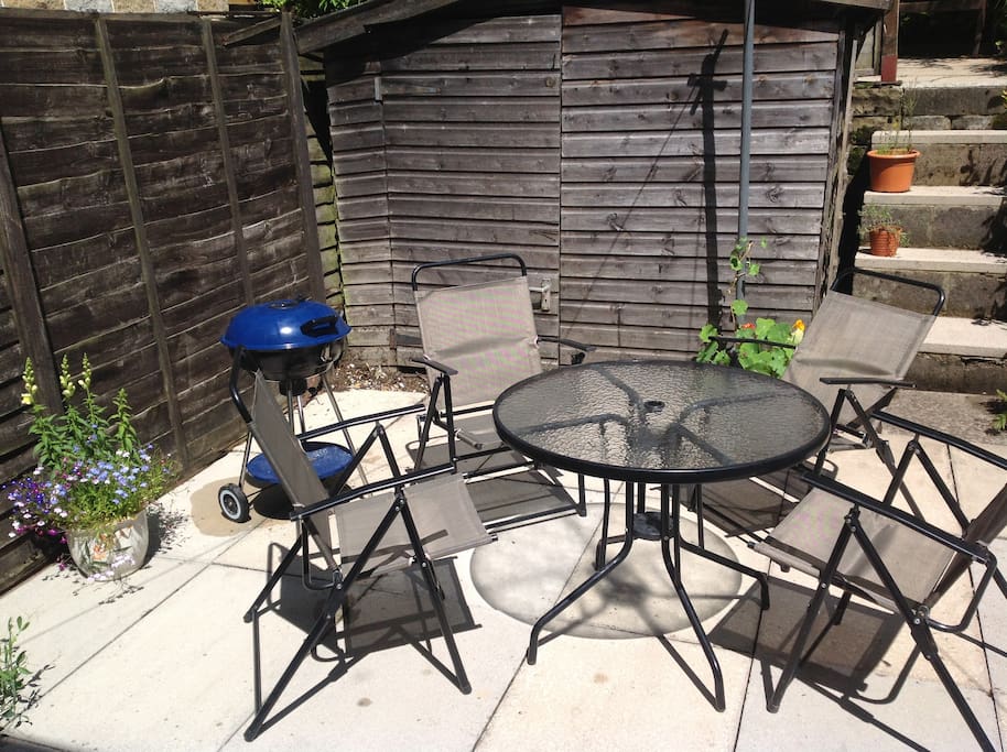 Patio garden with garden furniture and bbq set