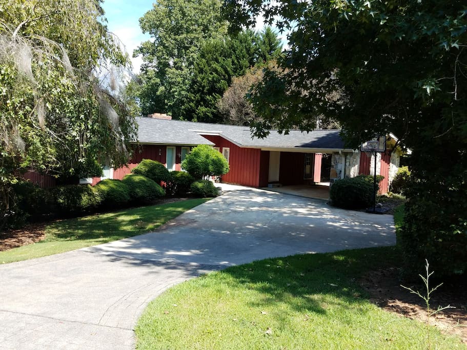 Red Country house on the corner with plenty of free parking. Can fit 5 cars.