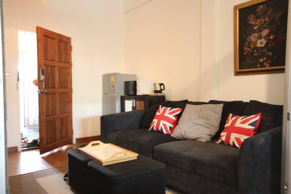 The couch (can be converted to a bed) and fridge