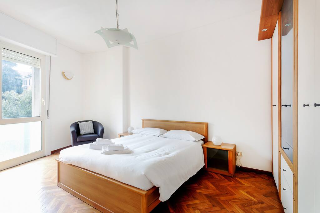 The double bedroom with: tv and the spacious wardrobe