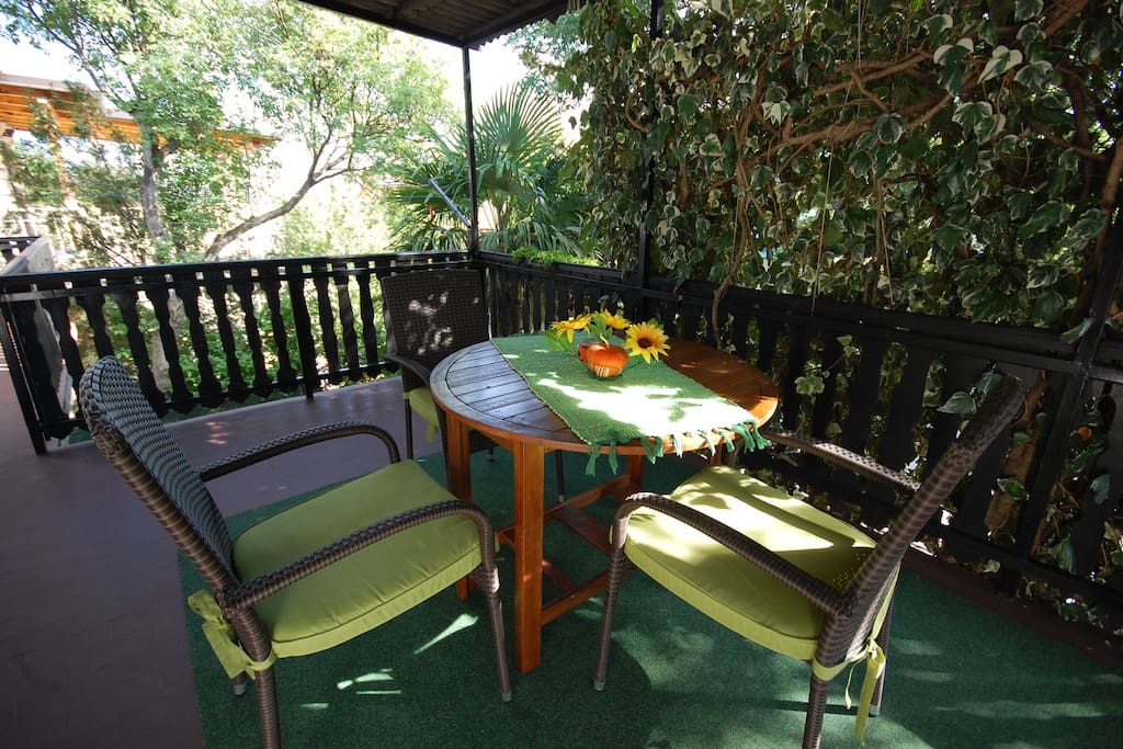 Terrace with furniture.