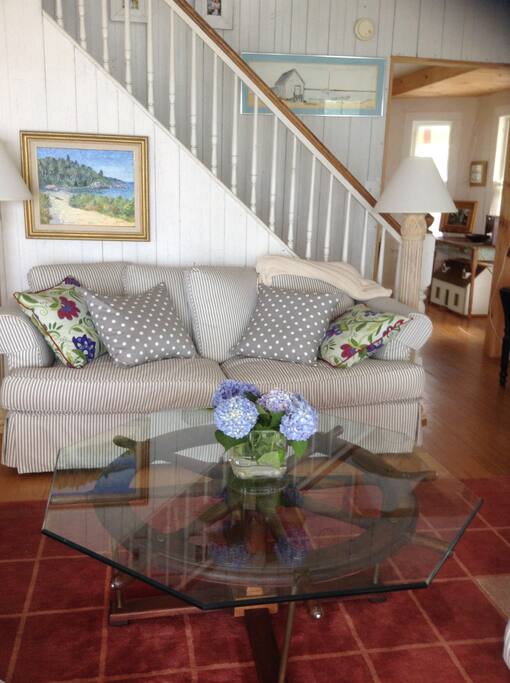 Living Room with views of the sunset and french doors that open onto the porch