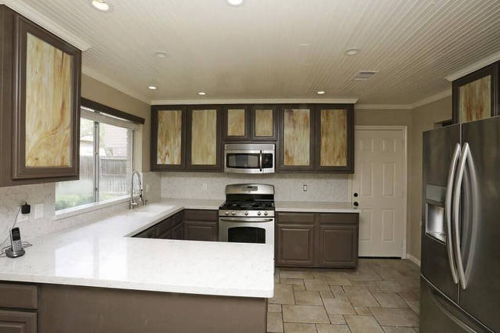 Newly decorated kitchen, marble silestone and updated cabinets.