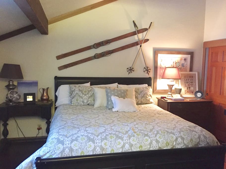 Master bedroom with king bed and private bath