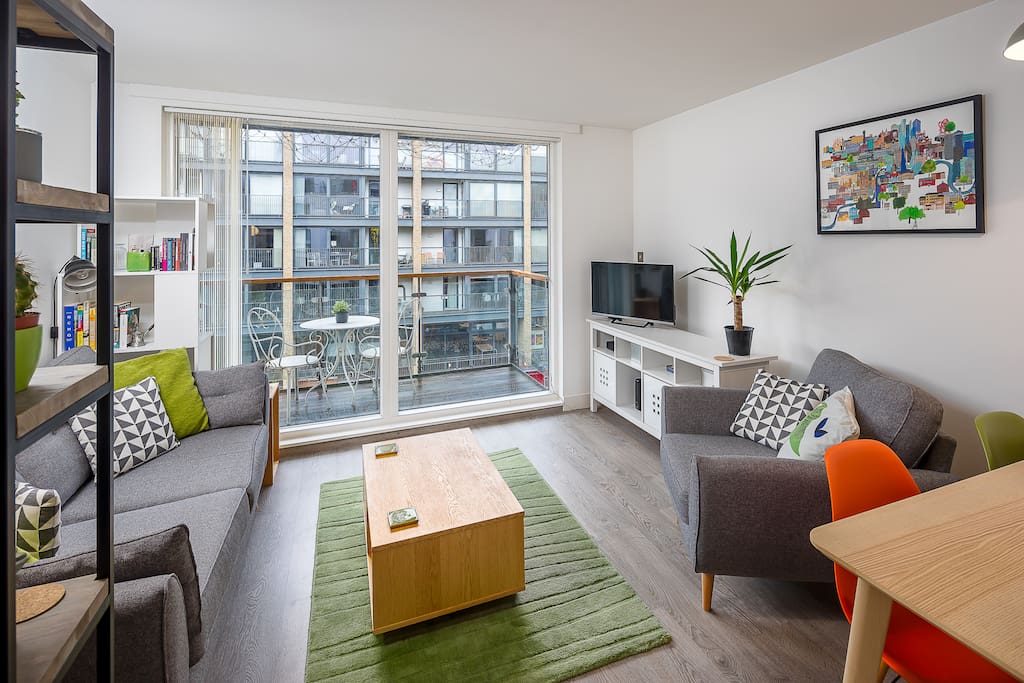 A lovely and bright space with a private balcony and colourful decor