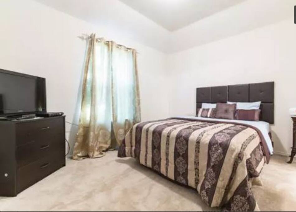 Upstairs Bedroom 1 with own TV - direct access to Toilet and Bath