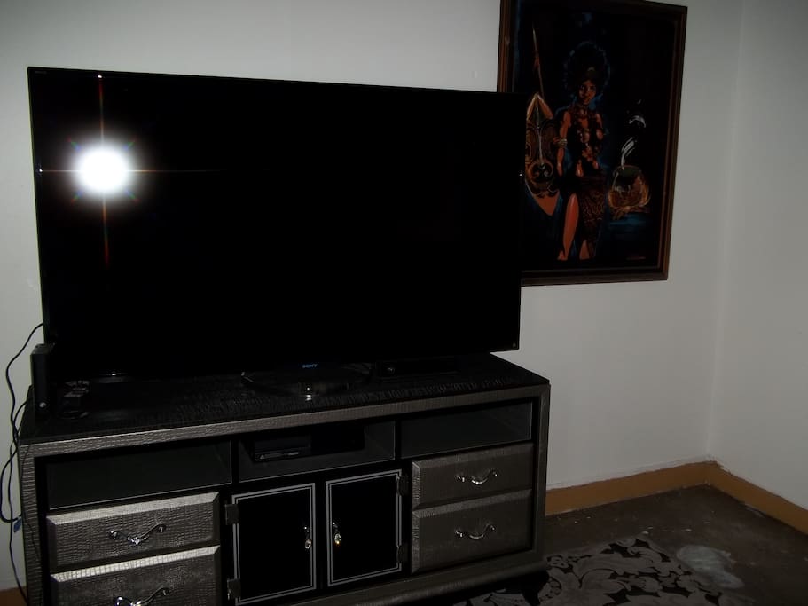 This is a 70" TV with stand.