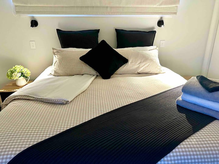 Comfortable Super King bed with Egyptian cotton sheets.