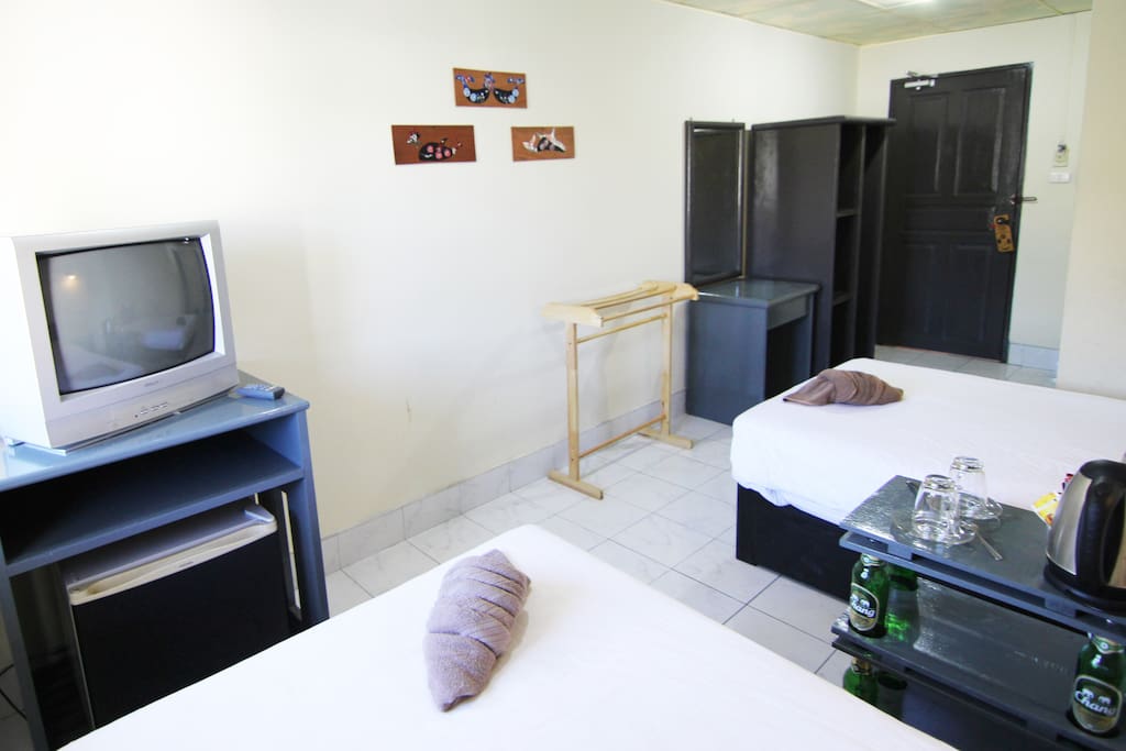 Standard Twin Room w/ Mini-Fridge, Tube Sat-TV, Clothes Rack and Wardrobe