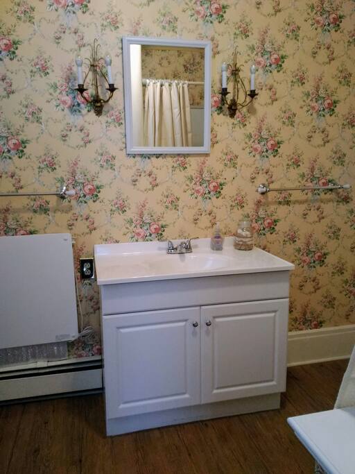 Private Bathroom with tub and shower over