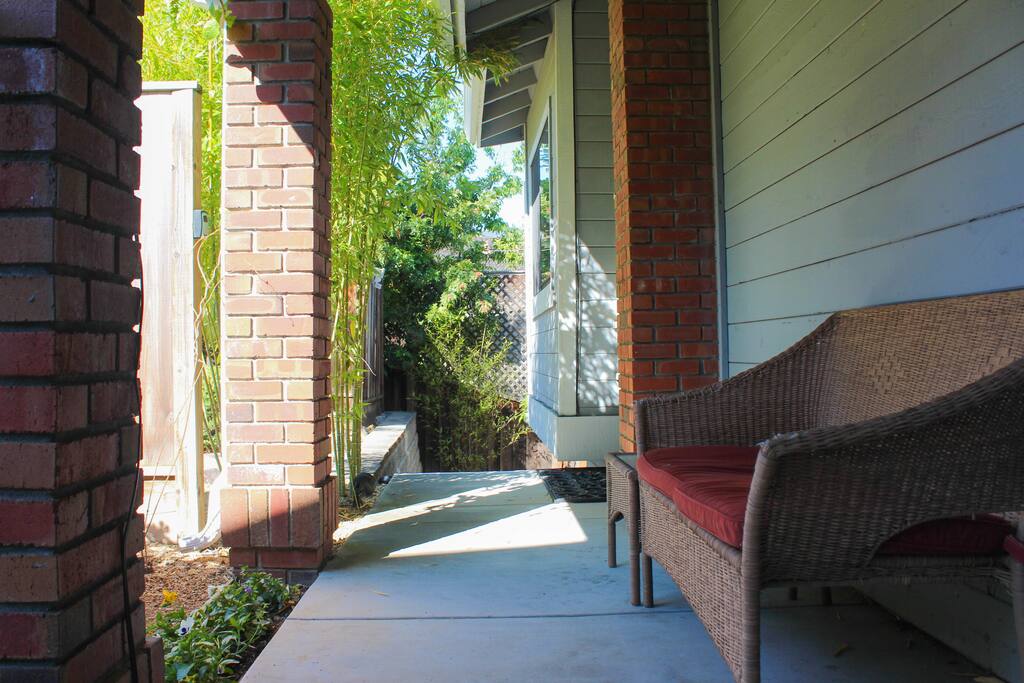 Sidewalk to guest entrance on the side of the house