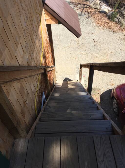 The stairs are on the exterior of the building.