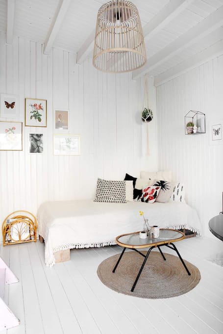 Living area with 3e bed/couch.