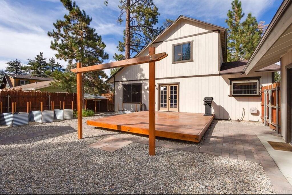 Fence door backyard, missing patio furniture now present (see photo below)