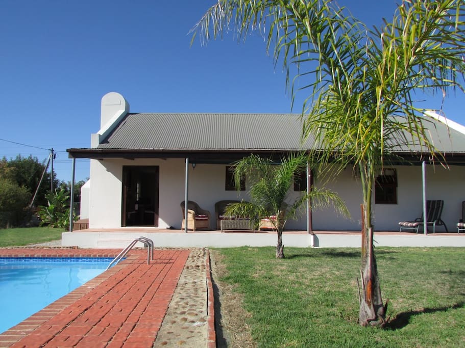 Sparkling pool overlooked by the veranda