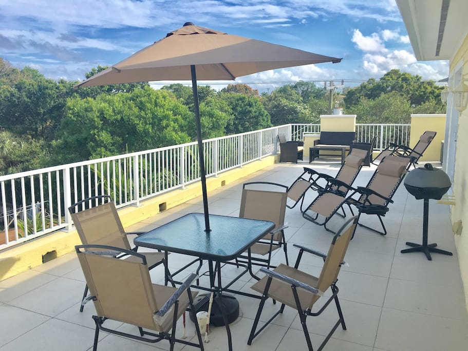 Large terrace that is shared by guests with great views of downtown Fort Lauderdale to enjoy a beautiful sunset after a beach day.