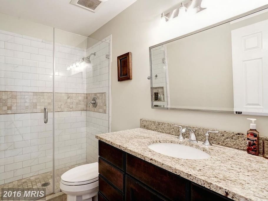 En suite master bathroom for private guest use.