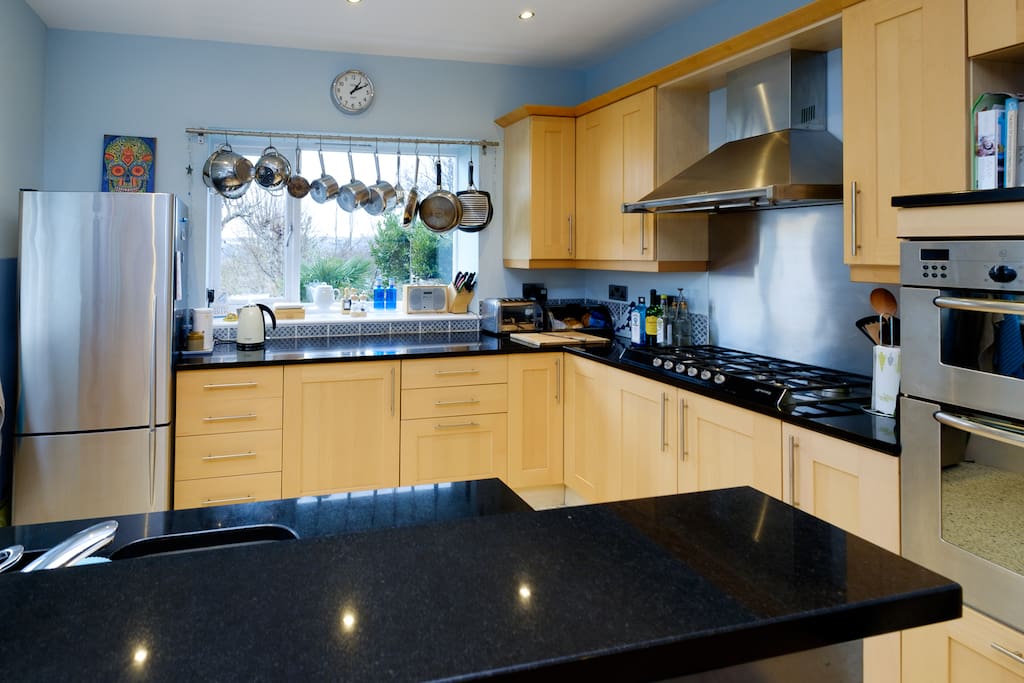 Kitchen has a double oven and dishwasher. There is a microwave oven in the utility room.