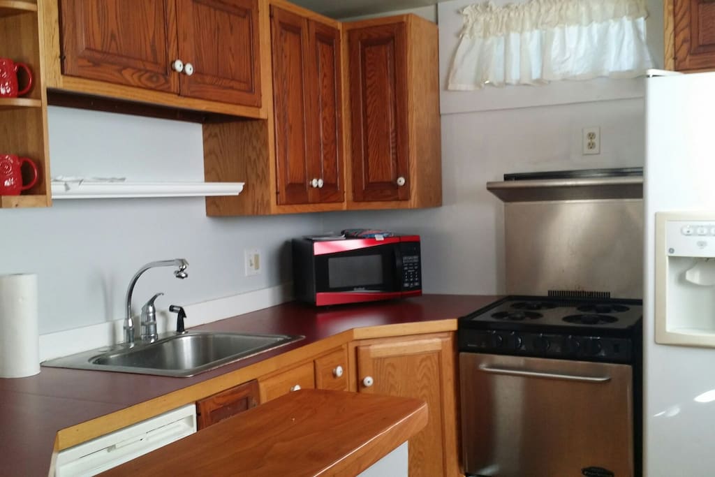 Gas stove, microwave, garbage disposal, dishwasher & refrigerator