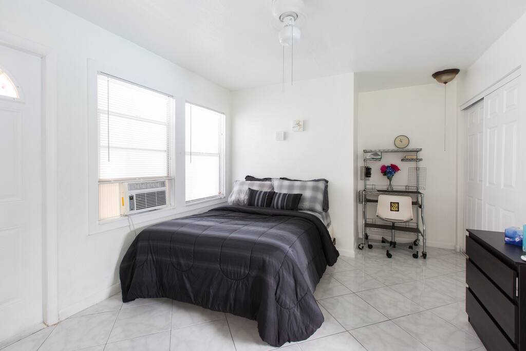 Bedroom has a full size bed and computer desk