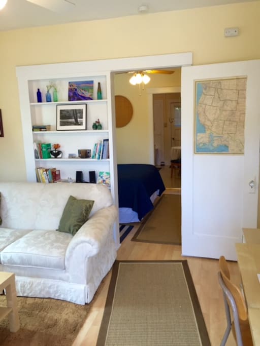 View from the front door into the bedroom and the kitchen beyond.