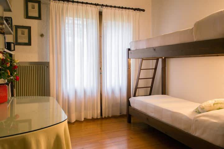 Bunk beds on first floor with exit in the garden 