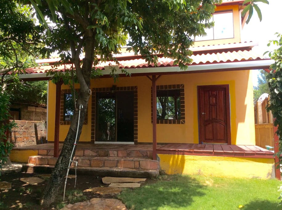 Front of home and porch. Your door is on the left. Our separate unit door is on the right. Your space is private