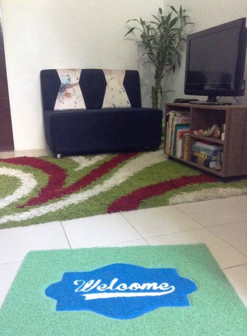 Sitting area with colored TV.
