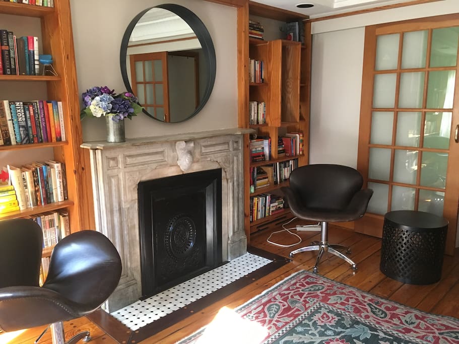 Sunny living-room with marble fireplace
