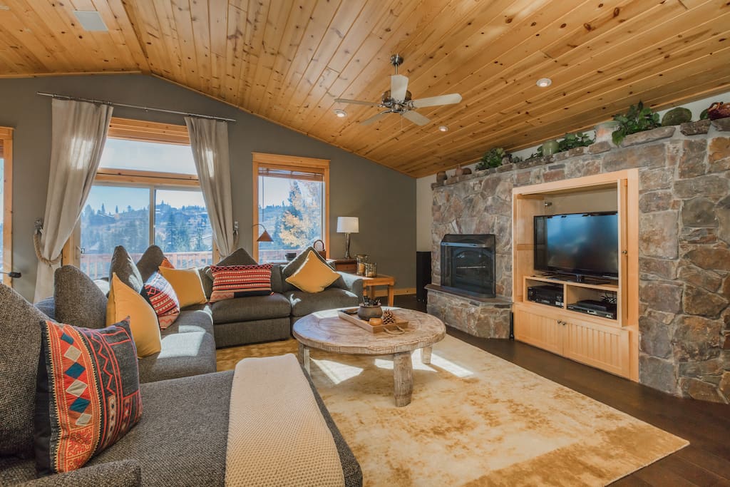 Built in top of the line entertainment system and gas fireplace enclosed in a natural rock hearth