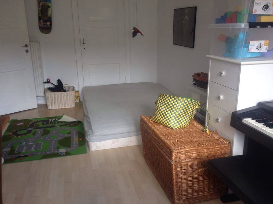 2. bedroom - one doublebed, also a desk, lots of toys and childrens books, and a electric piano.
