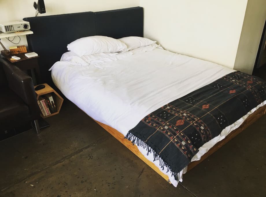 Queen size bed with wifi connected projector