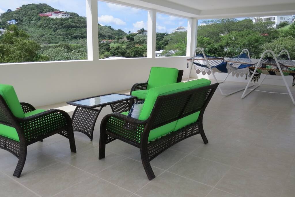 Terrace has 360-degree view of jungle and sea.